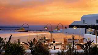 A sunset over the pool at Santo Maris Oia