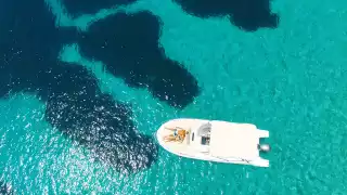 A couple relax on a boat