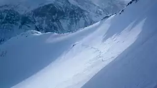 A spitboarder making a surf turn in Sweden