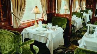 A dining room aboard the Belmond Venice Simplon-Orient-Express