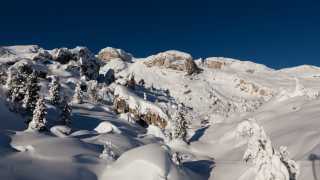 A snowy mountainscape in Corvara