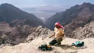 Eid Azzazmeh prepares mint tea on a mountaintop