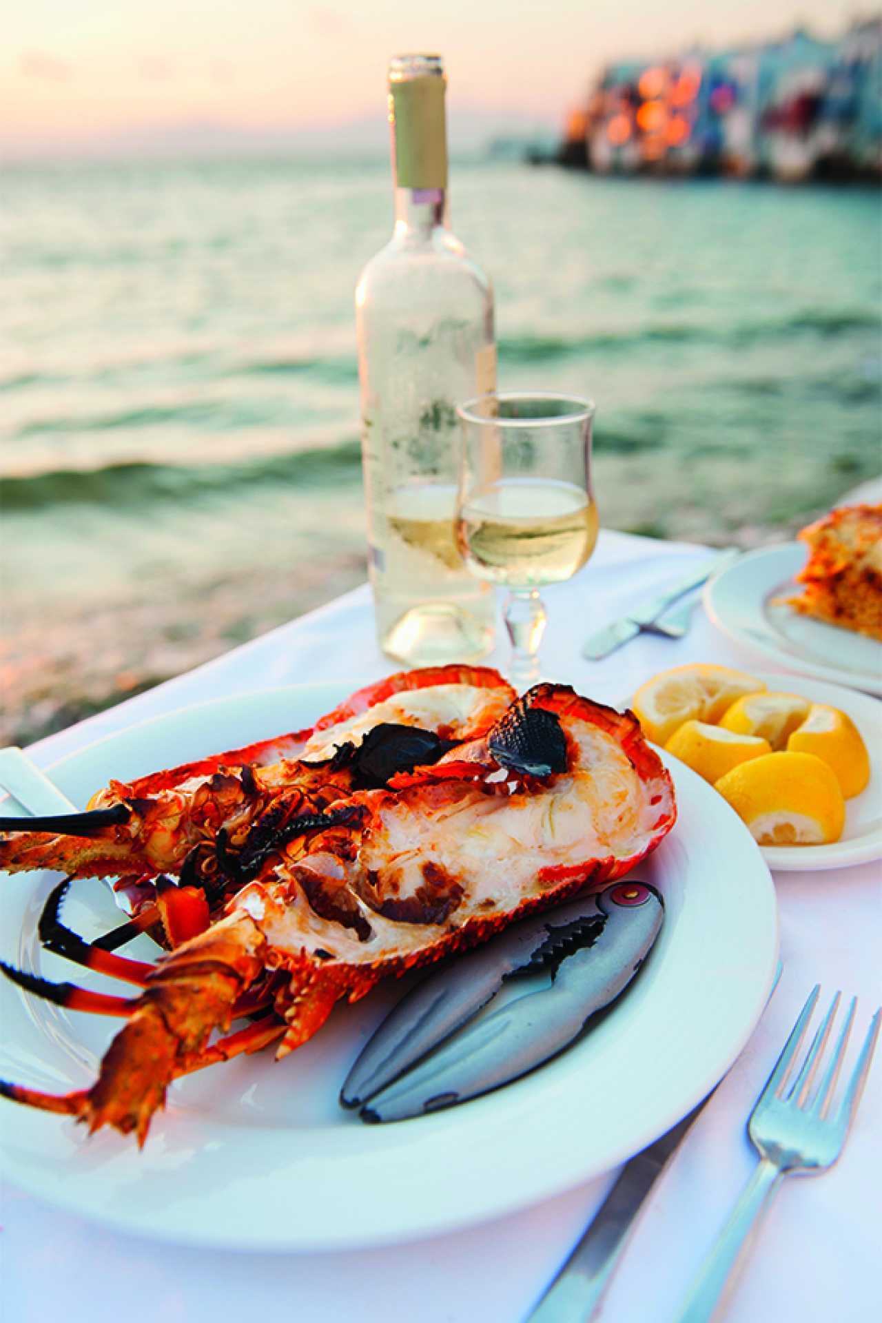 Eating lobster alfresco in Mykonos, Greece