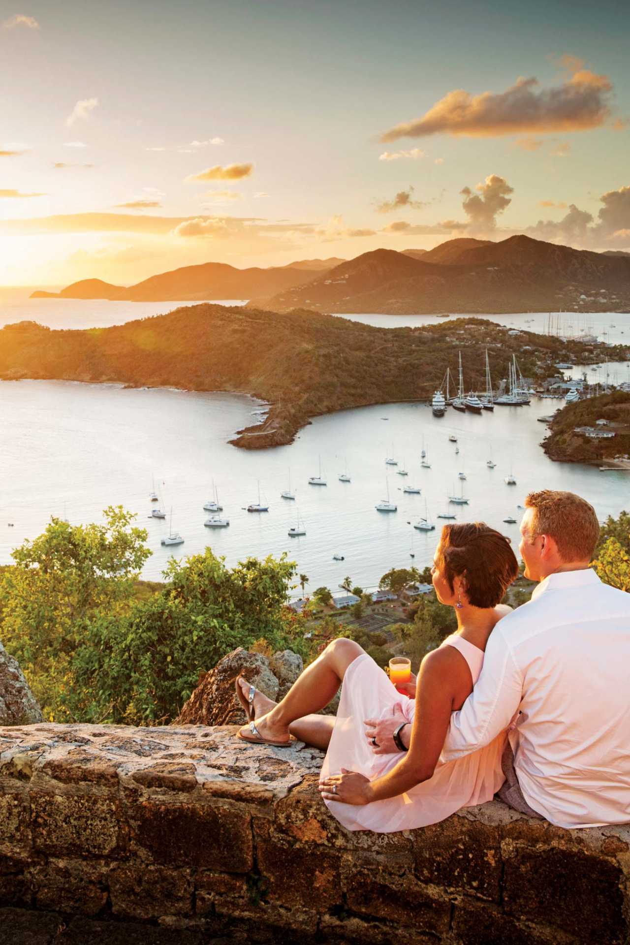 Couple overlooking Falmouth harbour in Antigua