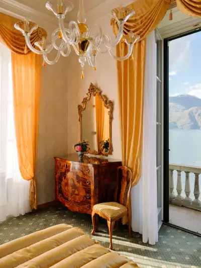 A dresser with a glimpse of the view from the Queen of Sweden suite
