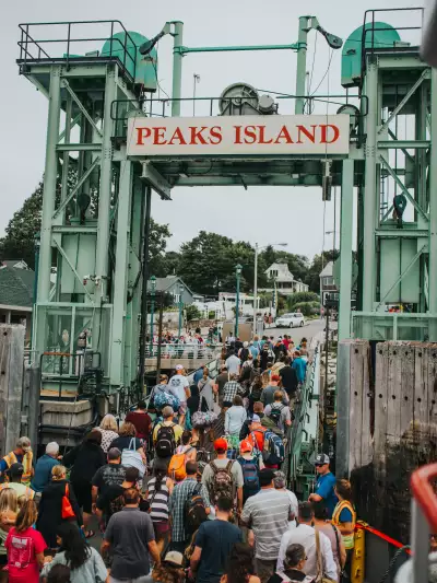 Passengers stream off the ferry at Peaks Island, a short ride across Casco Bay from Portland and one of the most accessible island escapes