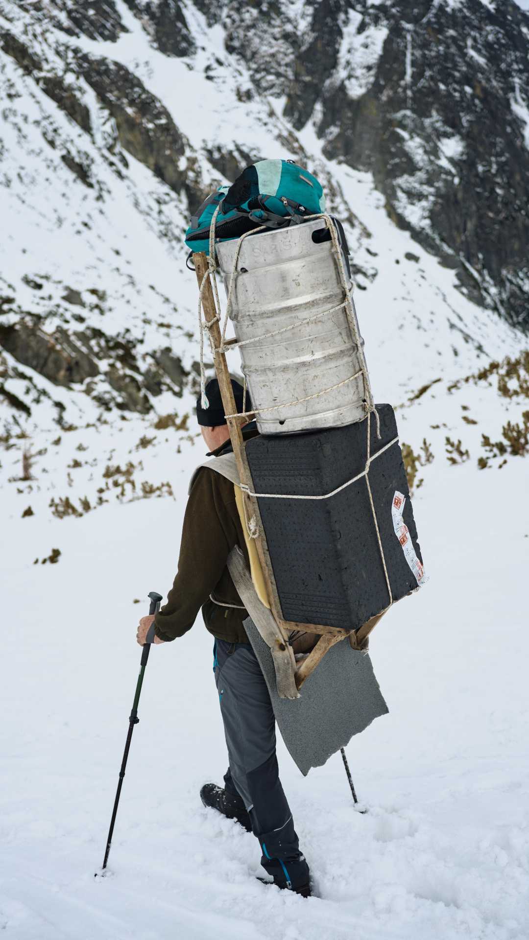 Hiking up the mountain with a beer keg in Slovakia Hiking up the mountain with a beer keg in Slovakia