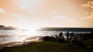 Sitting on the beach at Boardmasters festival in Newquay, Cornwall