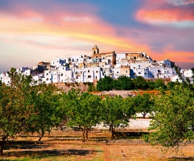 Medieval fortified town of Ostuni at sunset, Puglia, Italy