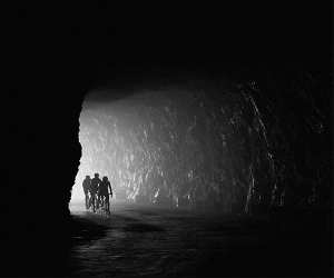 Cyclists on a pass in the Swiss alps