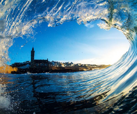 Through-wave view of Porthleven, Cornwall