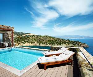 A villa pool area at Daios Cove