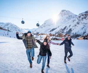 A family on the slopes at Val d'Isère ski resort