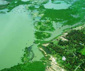 A verdant landscape of lakes and palm trees as seen from a nine- seater seaplane flying from Hatton to Yala National Park