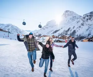 A family on the slopes at Val d'Isère ski resort